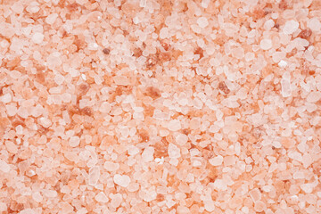 Texture of Himalayan pink salt as background, closeup