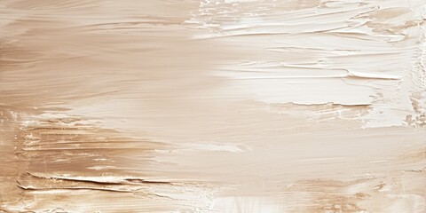 Wide view of a textured beige paint surface with dynamic and smooth strokes.
