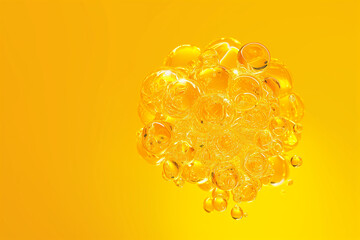 A cluster of shiny translucent yellow bubbles floats dynamically against a vibrant yellow background