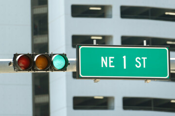 Traffic lights for traffic regulation high above street in Miami, Florida