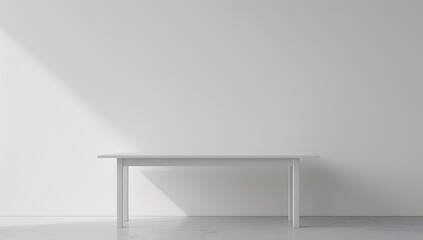 empty white table in front of white wall  