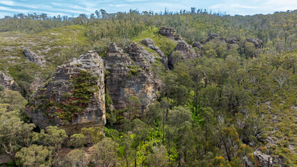 Fototapeta na wymiar Drone aerial photograph of the impressive sandstone rock formations in the Gardens of Stone State Conservation area near Lithgow in New South Wales in Australia