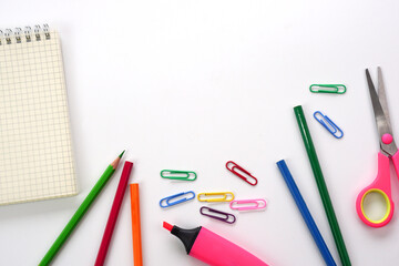 School supplies and office supplies on white background. Learning, study, office equipment and presentation concept.