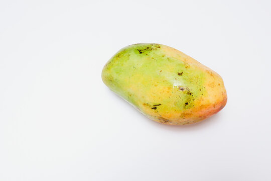 Close up image of mango fruit isolated on white background