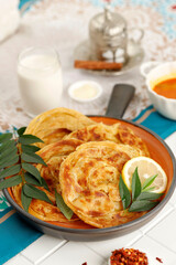 Roti Parata or Roti Canai with Lamb Curry Sauce