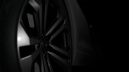 Detail on one of car rim modern car on black background,copy space