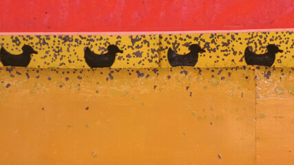 close up of vintage duck shooting game at carnival with space for text © Angela