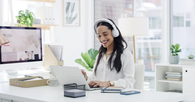 Laptop, dance and music with woman employee streaming on headphones to relax on break from work. Computer, smile and happy with young business person listening to radio sound for entertainment
