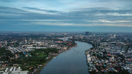Nighttime Urban Panorama Overlooking Barcelona's River and Bay with Spectacular Skyline Views, Architecture, and Summer Clouds