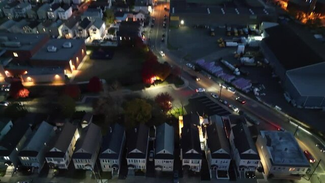 Ascending drone footage of the cityscape of Clifton at sunset in Passaic County, New Jersey, USA