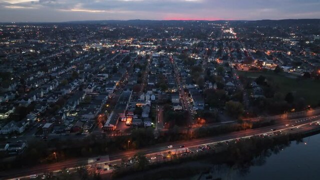 Aerial footage of the cityscape of Clifton at sunset in Passaic County, New Jersey, United States