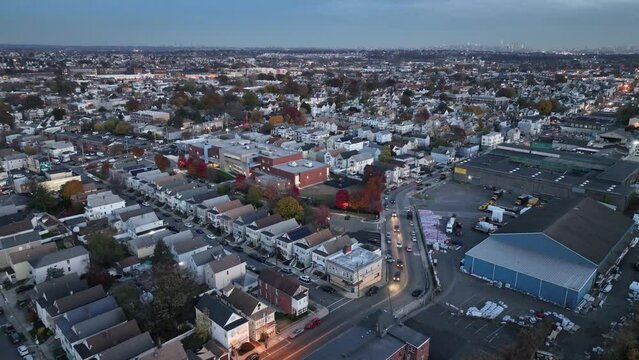 Drone footage of the buildings in Central Avenue in Clifton city at sunset in New Jersey, USA