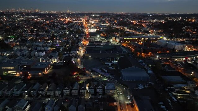Drone footage of a residential neighborhood in Central Avenue in Clifton city at night in New Jersey