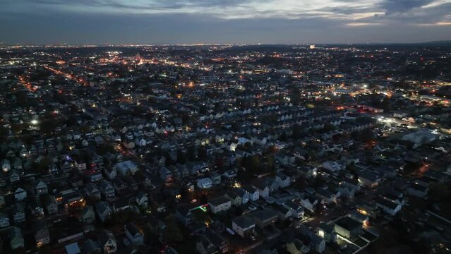 Aerial footage of the cityscape of Clifton at sunset in Passaic County, New Jersey, USA