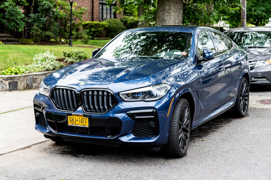 New York City, USA - August 26, 2023: BMW X6 SUV car crossover blue color, corner view