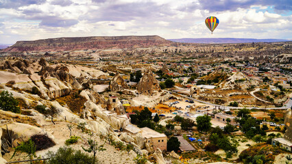 Panoramic view of a Balloon tour over with characteristic cave hotels, unique rock structures and...