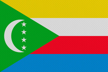 National flag of the Comoros. Background  with flag of the Comoros