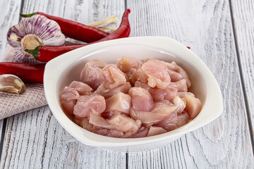 Raw uncooked chicken breast fillet