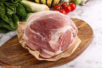 Uncooked raw pork knuckle with spices