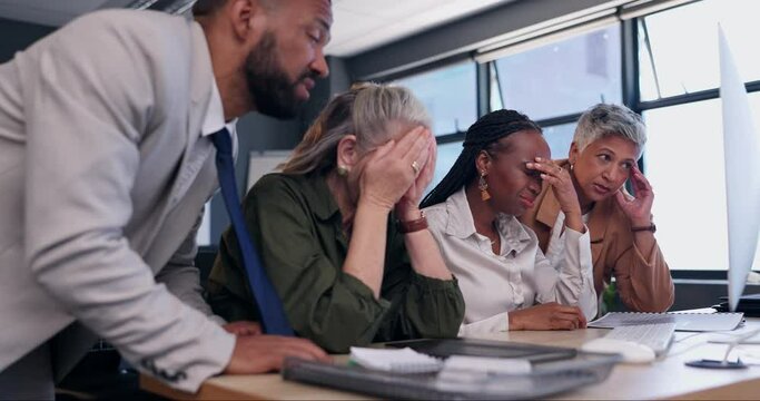 Business people, sad and stress in group by pc in office for lost financial investment for diversity at job. Women, person or staff for worry, stock market crash or mistake for fail, crisis or agency