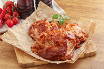 Marinated chicken leg in tomato sauce