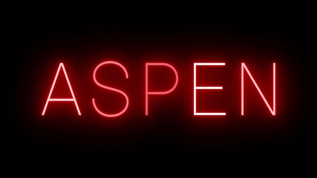 Flickering red retro style neon sign glowing against a black background for ASPEN
