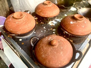 clay pot and wok pan for cooking javanese pancake called Serabi