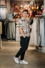 A person posing in a clothing store 5832.