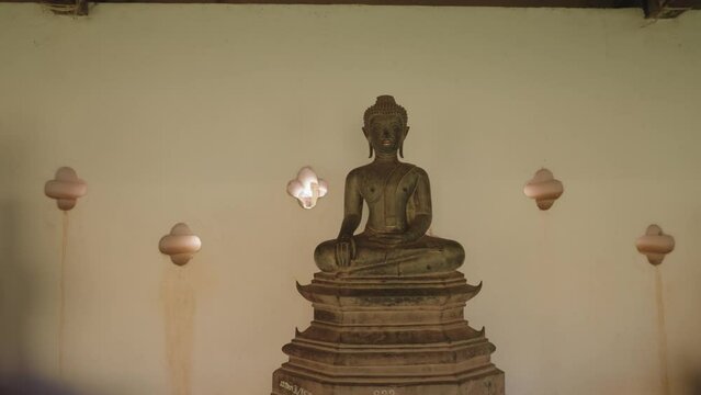 Buddha Image or Buddha Statue at the hall oh Pha That Luang, Golden Stupa Vientiane, Laos