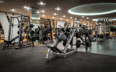 Modern gym interior with various equipment