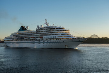 Early morning sunrise arrival of classic German cruiseship cruise ship liner into Montréal port, Quebec in Canada during St Lawrence Indian Summer cruising