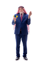 Old arab businessman holding credit cards isolated on white