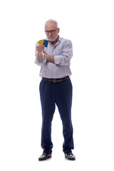 Old businessman holding credit card isolated on white