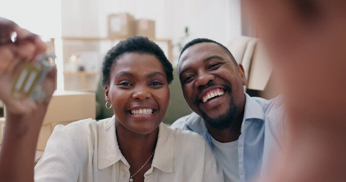 Couple, new house and selfie with boxes and key for celebration, mortgage or investment with smile. African, man and woman in real estate property with achievement, first home and commitment or love