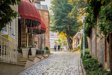 Soguk Cesme Sokak, small car free cobblestone street with historic houses in Sultanahmet, between Hagia Sophia and Topkapi Palace, Istanbul, Turkey