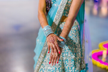 Indian bride's henna mehendi mehndi hands close up
