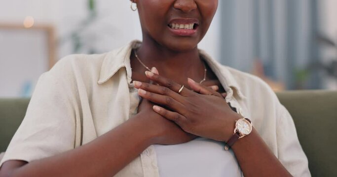 Hands, woman and chest pain on sofa, sick and stress for healthcare, bronchitis and lung infection in home. Girl, person and breathing with tuberculosis, emergency and asma on lounge couch in house