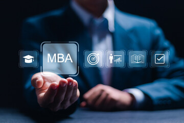 MBA or master of business administration program concept. Businessman holding virtual MBA icons for...