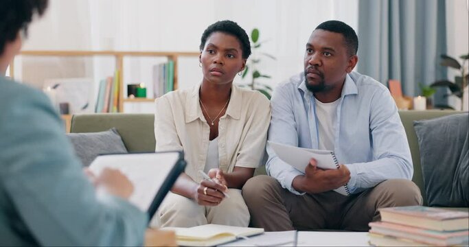 Financial advisor, man and woman on couch in consultation for home loan application, insurance and talking. Interview, paperwork and black couple on sofa with realtor for investment in real estate.