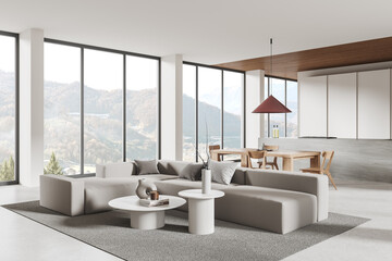 Modern home studio interior with relaxing and cooking zone, panoramic window