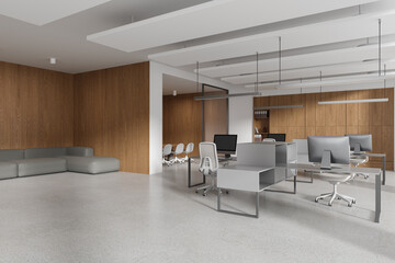 Stylish office interior with meeting and coworking space, relax corner with sofa