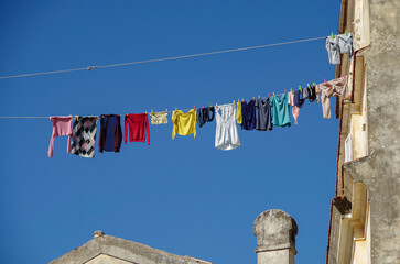 Romantic backstreet, side street or alleys in historic old town of Corfu Island, Greece with...