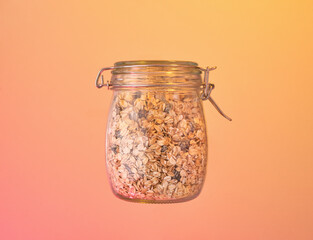 Dry healthy breakfast in a glass jar. Proper nutrition and figure.