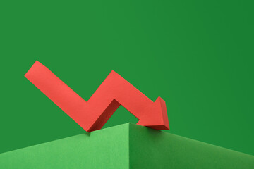 The red arrow goes down. Concept of investment. Copy space for text.