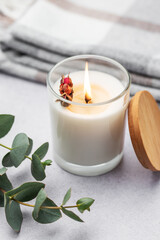 Aromatic candle on the table.