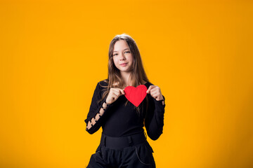 Child girl holding paper heart. Love, Valentine day concept