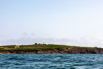 View of the coast of an island from the sea