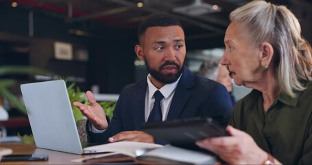 Business meeting, teamwork and laptop with communication in cafe for planning, confidence or discussion. Employees, man or woman with collaboration for corporate project or networking in coffee shop