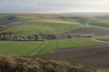 Various fields, wide lands, and valleys. With interesting colors, lines, and textures. Shot in France.
