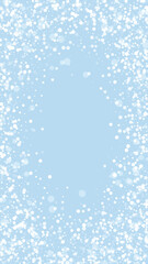 Snowfall overlay christmas background. Subtle flying snow flakes and stars on light blue winter backdrop. Festive snowfall overlay. Vertical vector illustration.